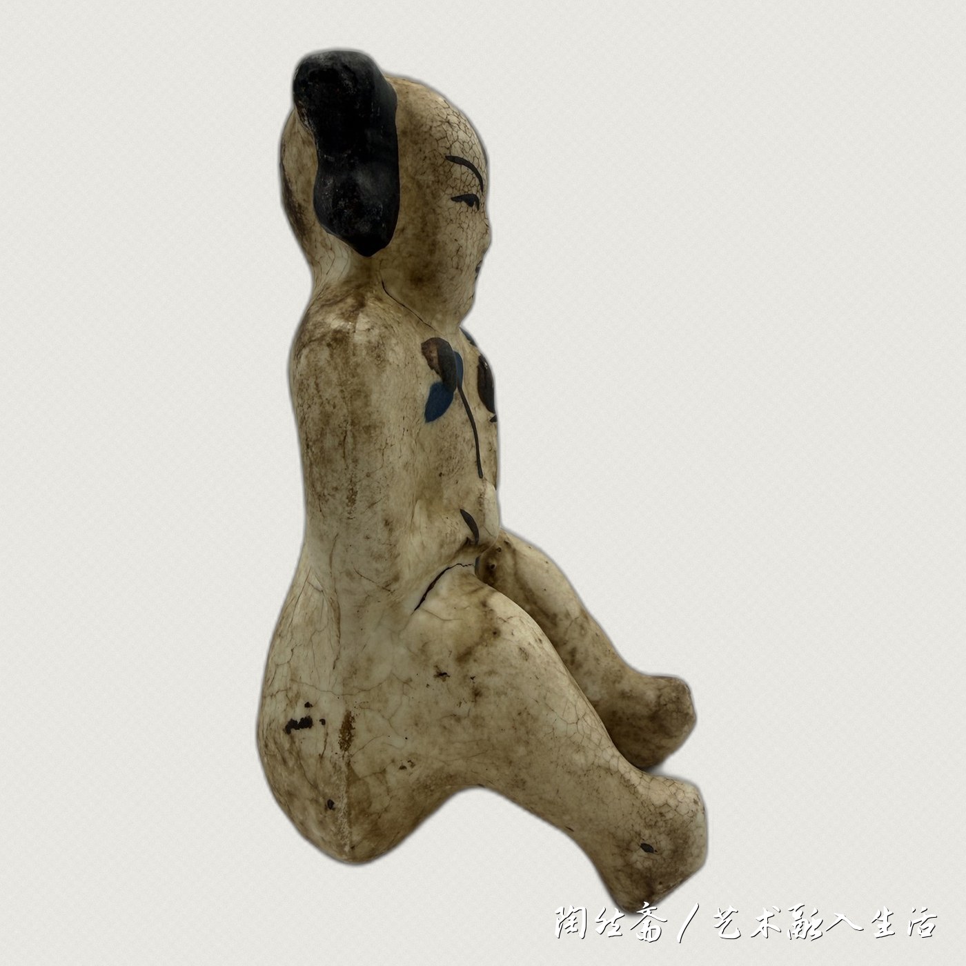 磨喝乐侧面,坐姿轮廓